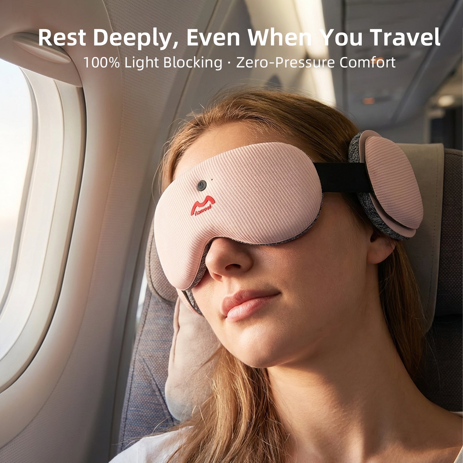 Woman using Fismool 201 pink sleep mask on an airplane for 100% light blocking during travel